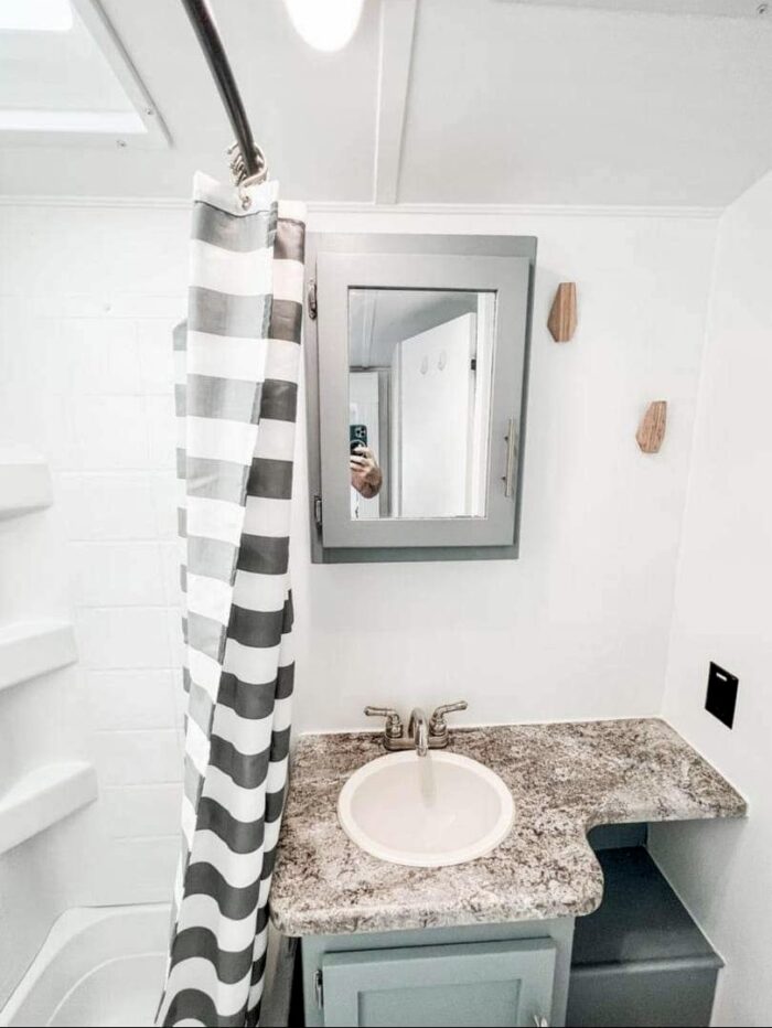 Bathroom vanity in Sunset Trail Super Lite Trailer