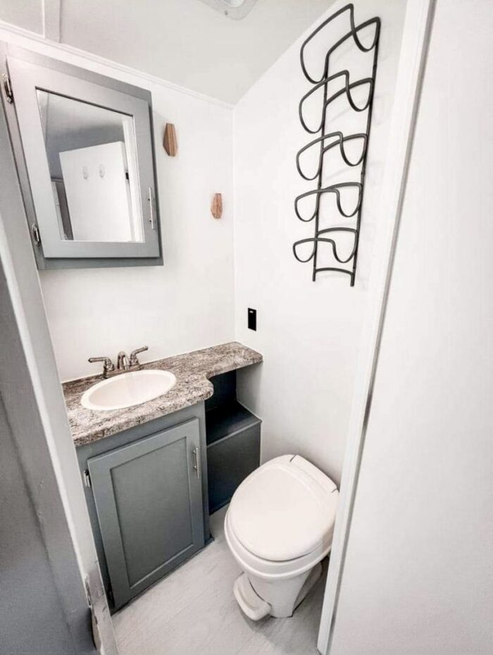 Bathroom with full size shower, vanity and toilet in Sunset Trail Super Lite Trailer